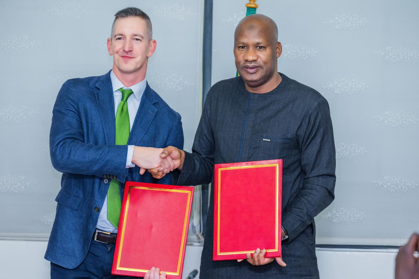 CIFF's Executive Director for SRHR, Miles Templay, with Dr. Ibrahima Sy Director of the Senegalese Ministry of Health and Public Hygiene during an official partnership declaration. Credit: CIFF